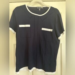 Fantastic stylish stretchy top. Looks amazing with white jeans. Karl Lagerfeld.